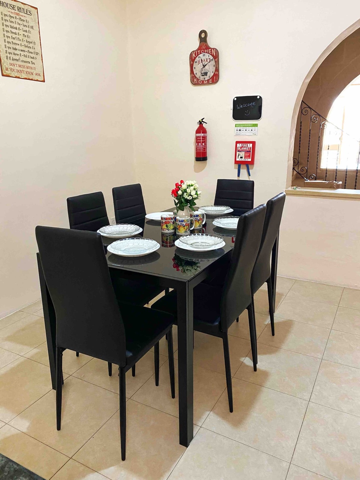 Well-equipped kitchen with crockery, glasses and cooking basics