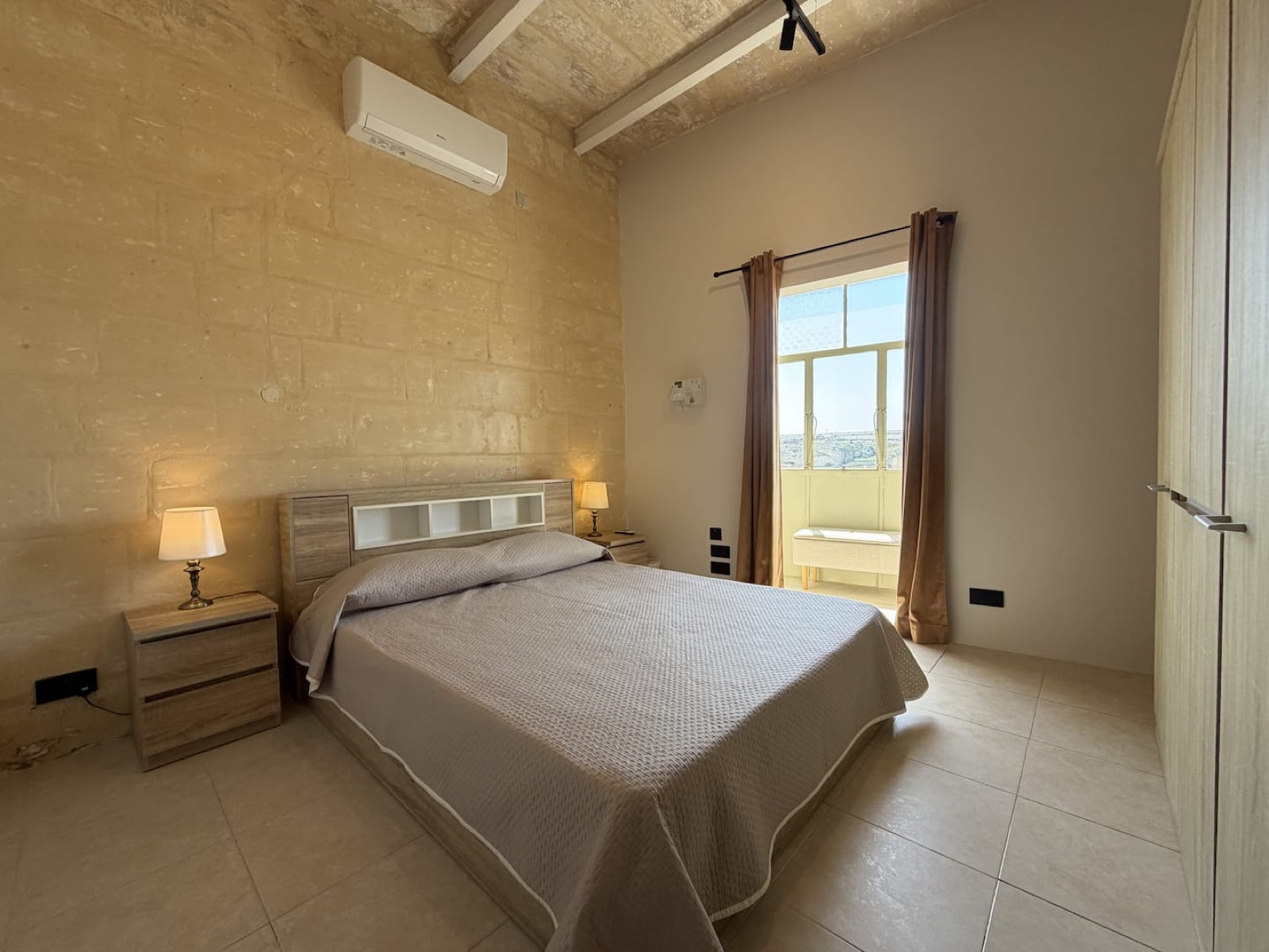 Double bedroom with traditional Maltese balcony