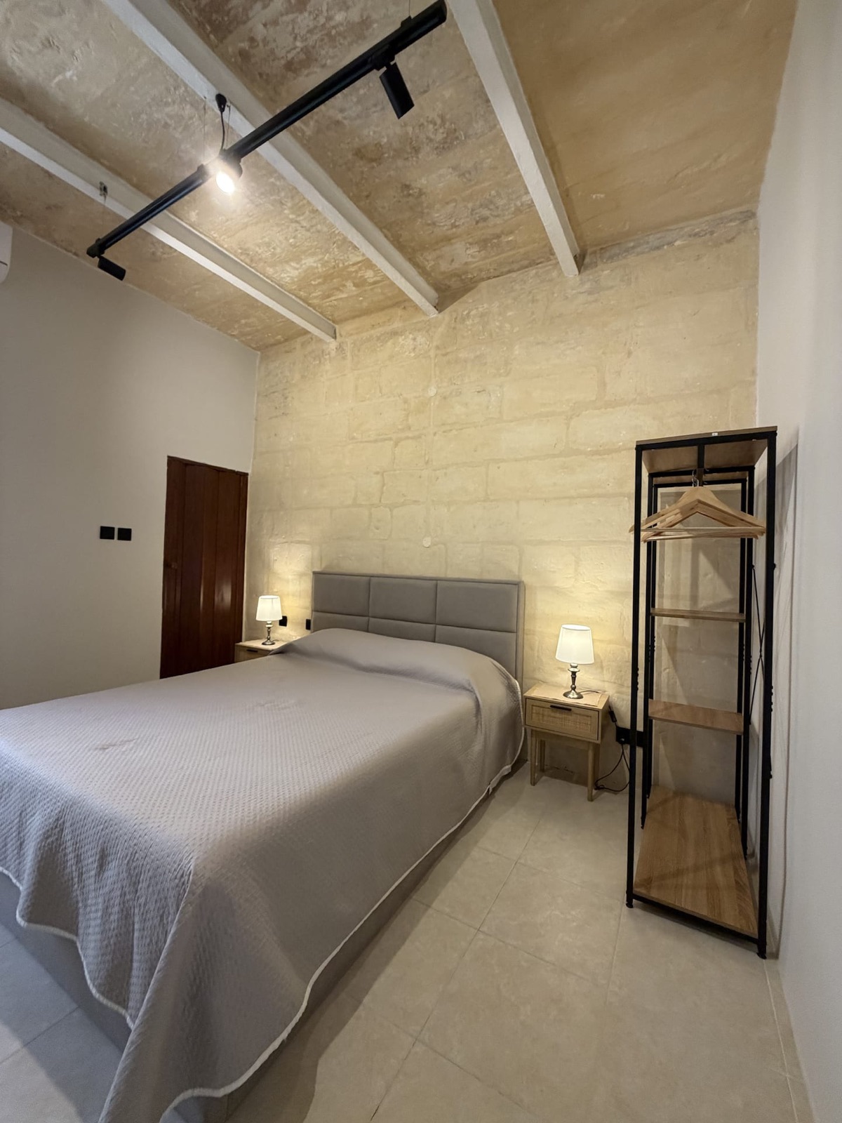 Main bedroom with ensuite bathroom and air conditioning