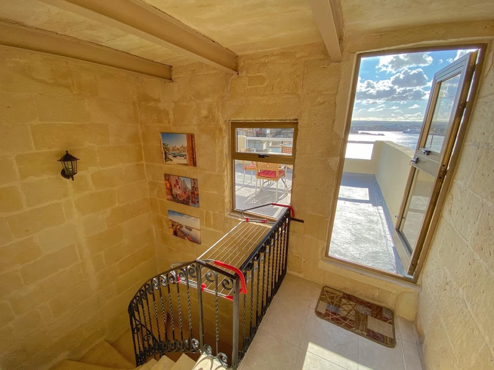 Roof terrace of the Senglea townhouse with Grand Harbour views