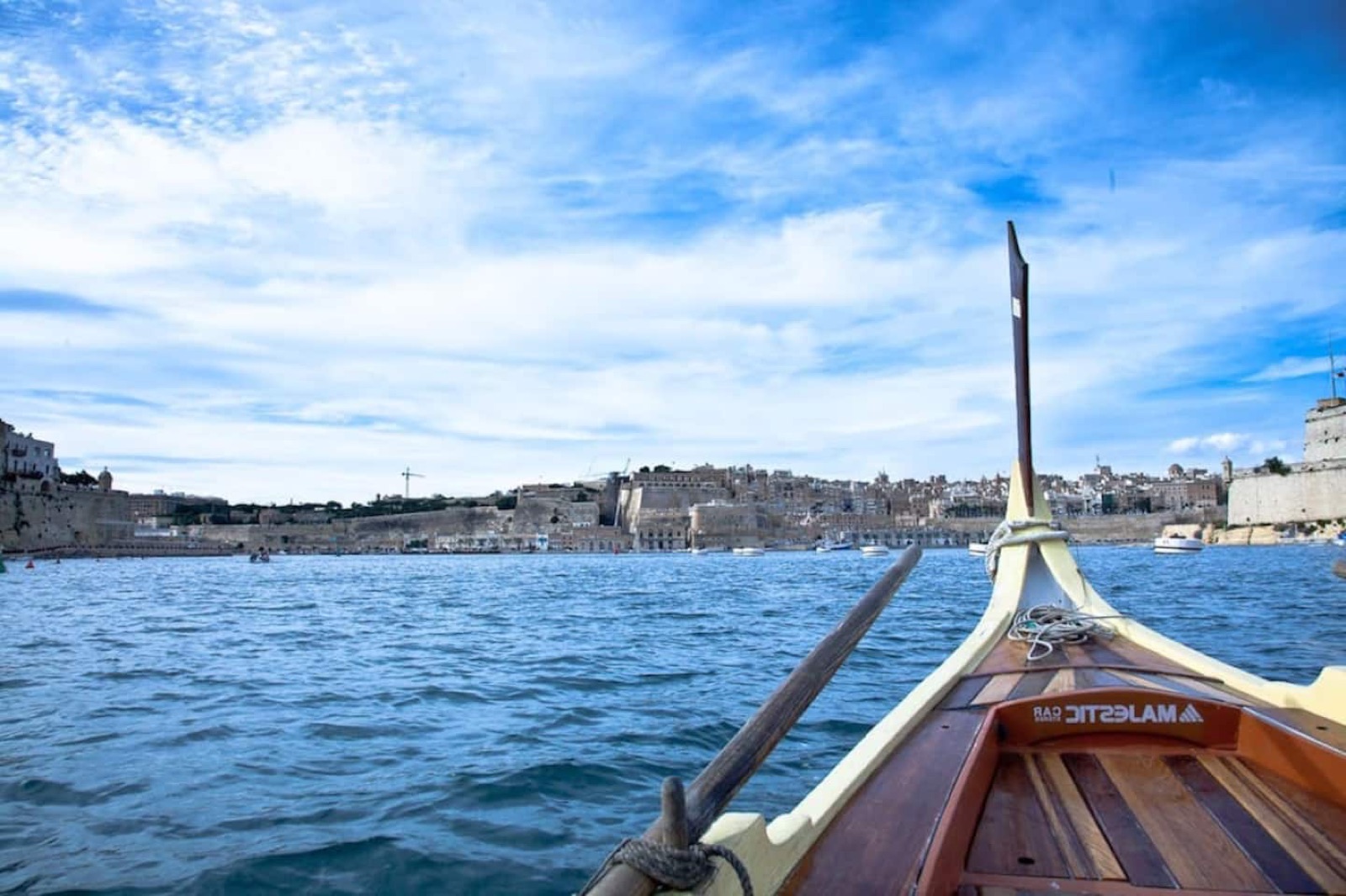 Traditional Maltese boat crossing to Valletta from Senglea